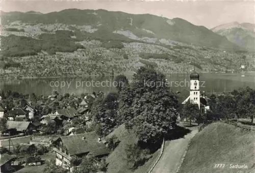 AK / Ansichtskarte Sachseln OW Panorama mit Kirche