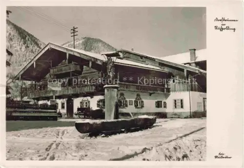 AK / Ansichtskarte Ruhpolding Bayern Dorfbrunnen Ortszentrum im Winter
