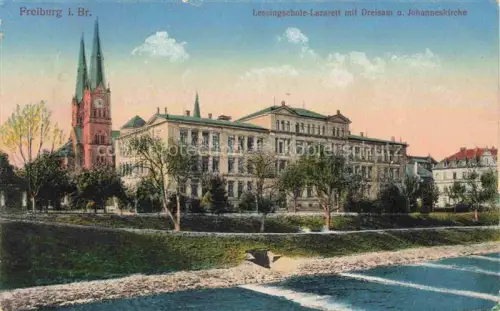AK / Ansichtskarte FREIBURG Breisgau BW Lessingschule mit Dreisam und Johanniskirche Feldpost