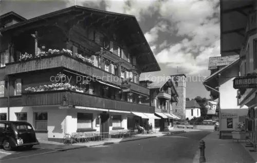AK / Ansichtskarte Adelboden Frutigen BE Dorfstrasse mit Hotel Baeren