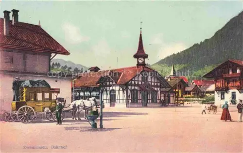 AK / Ansichtskarte Zweisimmen BE Bahnhof Postkutsche