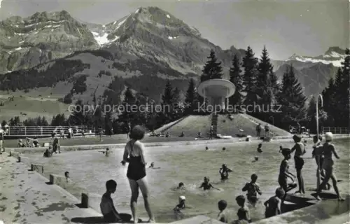 AK / Ansichtskarte Adelboden Frutigen BE Schwimmbad Blick gegen Grosslohner und Steghorn Berner Alpen