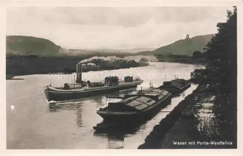 AK / Ansichtskarte PORTA WESTFALICA NRW Partie an der Weser Frachtkaehne Binnenschiffahrt
