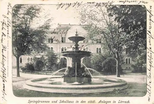 AK / Ansichtskarte LoeRRACH Baden BW Springbrunnen und Schulhaus in den staedtischen Anlagen Deutsche Reichspost
