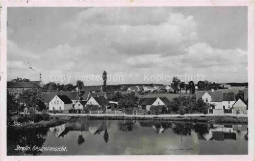 AK / Ansichtskarte Strelln Mockrehna Sachsen Teilansicht Partie am Wasser
