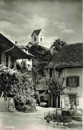 AK / Ansichtskarte Pieterlen Bueren BIEL-Bienne BE Motiv Ortszentrum Blick zur Kirche