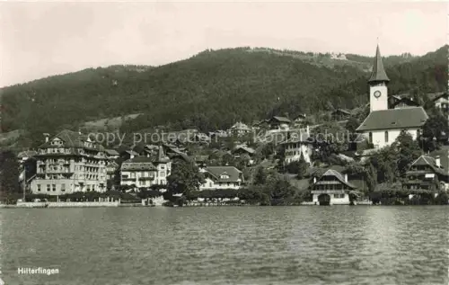AK / Ansichtskarte Hilterfingen Thunersee BE Ansicht vom See aus Blick zur Kirche