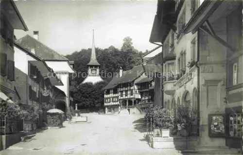 AK / Ansichtskarte LAUPEN BE Motiv im Ortszentrum Blick zur Kirche