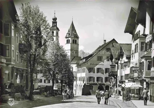 AK / Ansichtskarte Kitzbuehel Tirol AT Dorfpartie mit Kirche