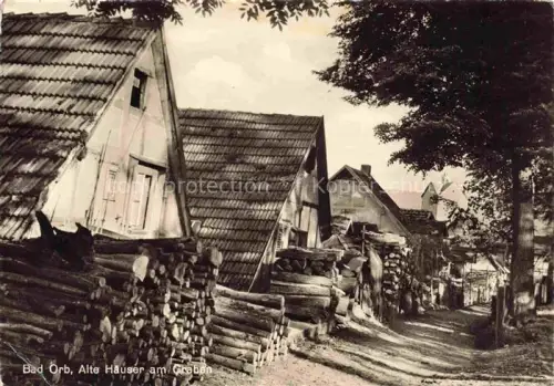 AK / Ansichtskarte BAD ORB Hessen Alte Haeuser am Graben