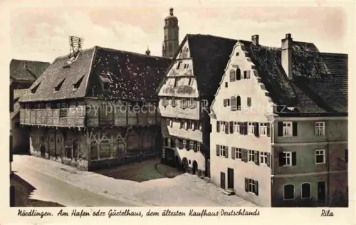 AK / Ansichtskarte Noerdlingen Bayern Am Hafen oder Guertelhaus dem aeltesten Kaufhaus Deutschlands