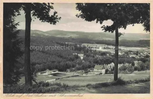 AK / Ansichtskarte Bad Sachsa Osterode Harz Niedersachsen Panorama mit Freibad
