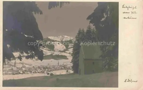 AK / Ansichtskarte Kitzbuehel Tirol AT Kapelle Winterlandschaft Fichten Schnee Stadtansicht