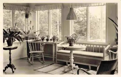 AK / Ansichtskarte Vrigstad Sweden Blomsterverandan Wintergarten Blumen Moebel Interieur