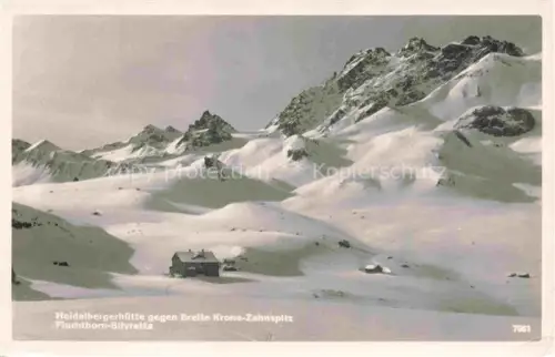 AK / Ansichtskarte Ischgl 1377m Paznauntal Tirol AT Bergwelt im Winter Heidelbergerhuette Silvretta