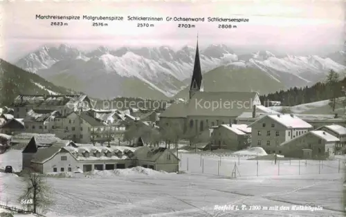 AK / Ansichtskarte SEEFELD  Tirol AT Ansicht mit Kirche Blick gegen Kalkkoegeln Winterpanorama