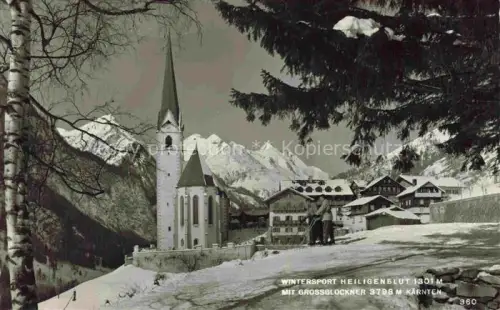 AK / Ansichtskarte HEILIGENBLUT Kaernten AT Ansicht mit Kirche Blick gegen Grossglockner Hohe Tauern