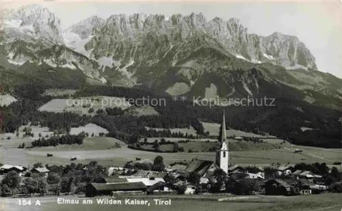 AK / Ansichtskarte Elmau Ellmau Tirol AT Ortsansicht mit Kirche Blick gegen Wilden Kaiser