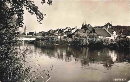 AK / Ansichtskarte Bueren Aare Uferpartie an der Aare Blick zum Ort
