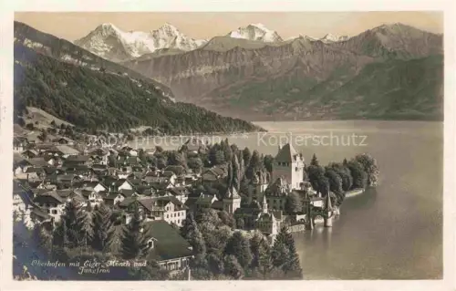 AK / Ansichtskarte Oberhofen BE Panorama Thunersee Eiger Moench und Jungfrau Berner Alpen
