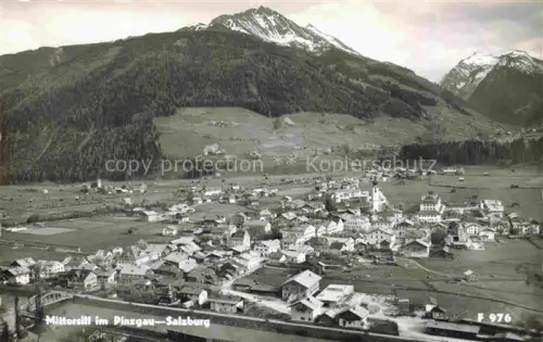 AK / Ansichtskarte Mittersill Oberpinzgau Salzburg AT Ortsansicht Pinzgau Berge Alpen Kirche Tal Wiesen Wald