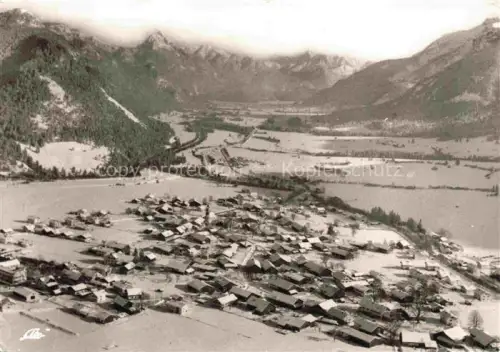 AK / Ansichtskarte Steinach Pfronten Wintersportplatz Saeuling Zugspitze Allgaeu Tal Dorf Fliegeraufnahme Schnee Bergpanorama