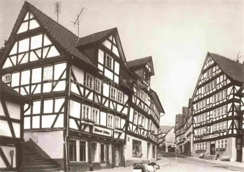 AK / Ansichtskarte Homberg Efze Bz Kassel Schwalm-Eder-Kreis Hessen Fachwerkhaeuser Marktplatz Baeckerei Altstadt Fachwerkarchitektur Strasse TV-Antennen