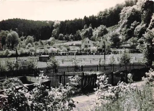 AK / Ansichtskarte Falkenberg Mark Brandenburg Luftkurort Wohnhaeuser Garten Zaun Wald DDR-Fotokarte