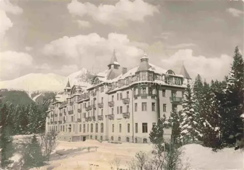 AK / Ansichtskarte Tatranska Lomnica Presovsky SK Grandhotel-Praha Hochgebirgshotel Winter Schnee Hohe-Tatra Tannen Berglandschaft