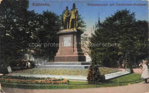 AK / Ansichtskarte KATOWICE Kattowitz PL Wilhelmsplatz Zweikaiser-Denkmal Kaiserdenkmal Bronzestatuen Sockel Blumenbeet Park