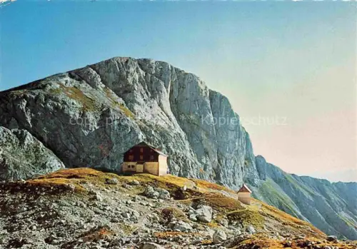 AK / Ansichtskarte Guttenberghaus 2187m Dachstein AT Schutzhuette Felsenwand Berglandschaft Geroell Almhuette Felsgipfel