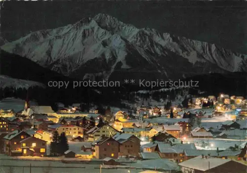 AK / Ansichtskarte SEEFELD Tirol AT Winternacht Nachtaufnahme Hocheder Beleuchtung Schnee Bergdorf Kirchturm Talansicht