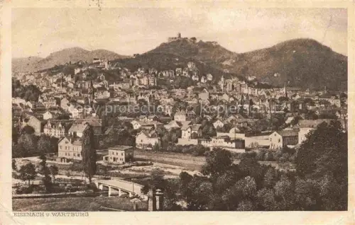 AK / Ansichtskarte EISENACH Thueringen Wartburg Stadtpanorama Berge Bruecke Wohnhaeuser Kirche Baeume