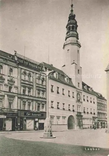 AK / Ansichtskarte Lauban Luban PL Marktplatz Rathaus Turm Pelzwaren Geschaefte Kreisstadt Queis Uhr