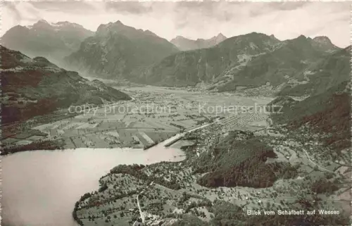 AK / Ansichtskarte Weesen  Walensee SG Walensee Fliegeraufnahme Tal Alpen Dorf Wiesen Bergketten See