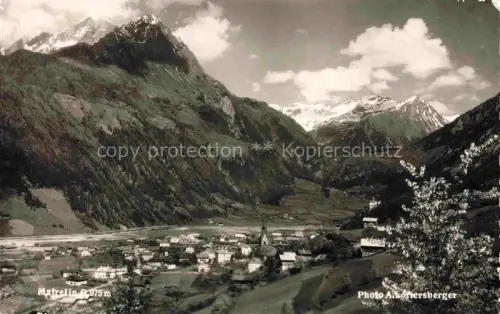 AK / Ansichtskarte Matrei Osttirol AT Bergtal Kirchturm Dorf Alpenpanorama Gletscher Wiesen Wald Talblick