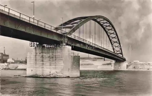 AK / Ansichtskarte Rheinhausen  DUISBURG NRW Rheinbruecke Rhein Stahlbogenbruecke Brueckenpfeiler Industrie