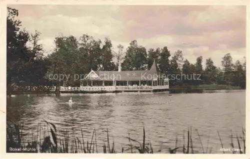AK / Ansichtskarte Bokel Bremerhaven Bokel-Muehle See Schwan Gasthaus Veranda Baeume Schilfgras