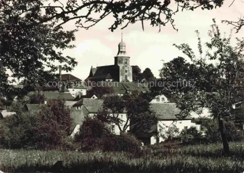 AK / Ansichtskarte Kittlitz Loebau Sachsen Kirchturm Daecher Dorf Baeume Wiese Oberlausitz