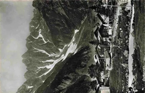 AK / Ansichtskarte Guttannen BE Berge Gletscher Schneefelder Chalets Bergbach Bergdorf Haslital Hochgebirge