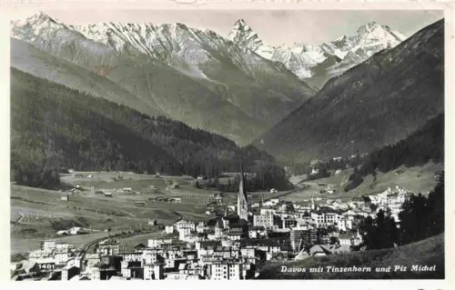 AK / Ansichtskarte DAVOS GR Tinzenhorn Piz-Michel Tal Berge Dorf Kirche Panorama