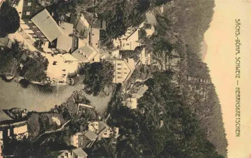 AK / Ansichtskarte Herrnskretschen Boehmen Hrensko CZ Saechsisch-Boehmische-Schweiz Kamnitz Felsen Tal Kirche Wald Ortschaft
