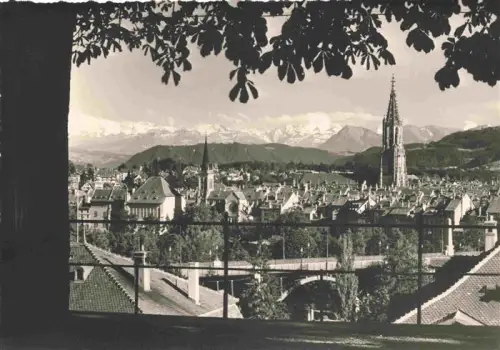 AK / Ansichtskarte BERN BE Muenster Alpen Stadtpanorama Kirchturm Baeume Bruecke Daecher