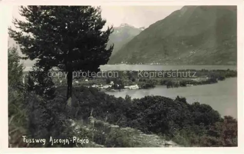 AK / Ansichtskarte Ronco Ascona Locarno Lago Maggiore TI Fussweg-Ascona-Ronco Lago-Maggiore See Berge Baum Ufer