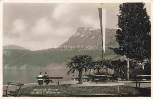 AK / Ansichtskarte Beckenried Vierwaldstaettersee NW Vierwaldstaettersee Kurplatz Niederbauen See Berge Bank Palme Fahne Pavillon