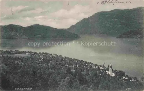 AK / Ansichtskarte Beckenried Vierwaldstaettersee NW Vierwaldstaettersee Dorf Kirche Panorama Berge Hotel-Sonne See