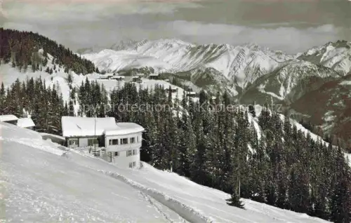 AK / Ansichtskarte Riederalp Raron VS Sporting-Bar Restaurant-Tea-Room Bazar Winter Schnee Wald Bergpanorama
