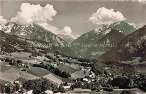 AK / Ansichtskarte Hasliberg Goldern Bruenig-Hasliberg Bergpanorama Tal Wiesen Wald Dorf Alpen