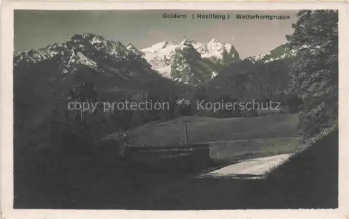 AK / Ansichtskarte Hasliberg Goldern Wetterhorngruppe Bergpanorama Wiese Wald Strasse Alpen