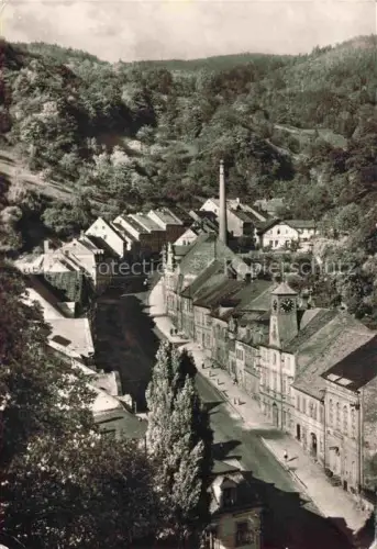 AK / Ansichtskarte Krupka Aussig Graupen Erzgebirge CZ Husitská-ulice Komá?í-Víka Rathaus Fabrikschornstein Hauptstrasse Bergstadt Baeume Huegel